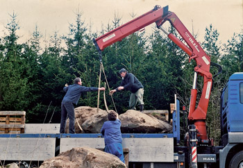 Lubo Kristek installing the sculpture The Wishing Stones